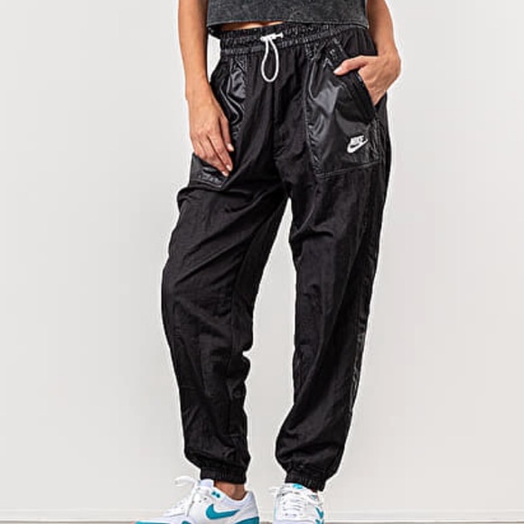 Nike Pants - Nike HighWaisted windbreaker pants Rebel tapered track joggers small